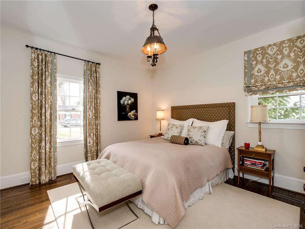 1418 Audubon Road Charlotte, NC 28211 - Photo 14 of 24 a bedroom with a bed and a window