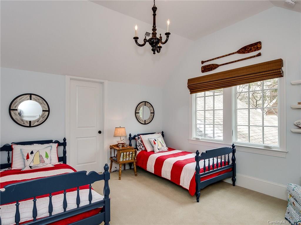 1418 Audubon Road Charlotte, NC 28211 - Photo 17 of 24 a bedroom with a bed and window