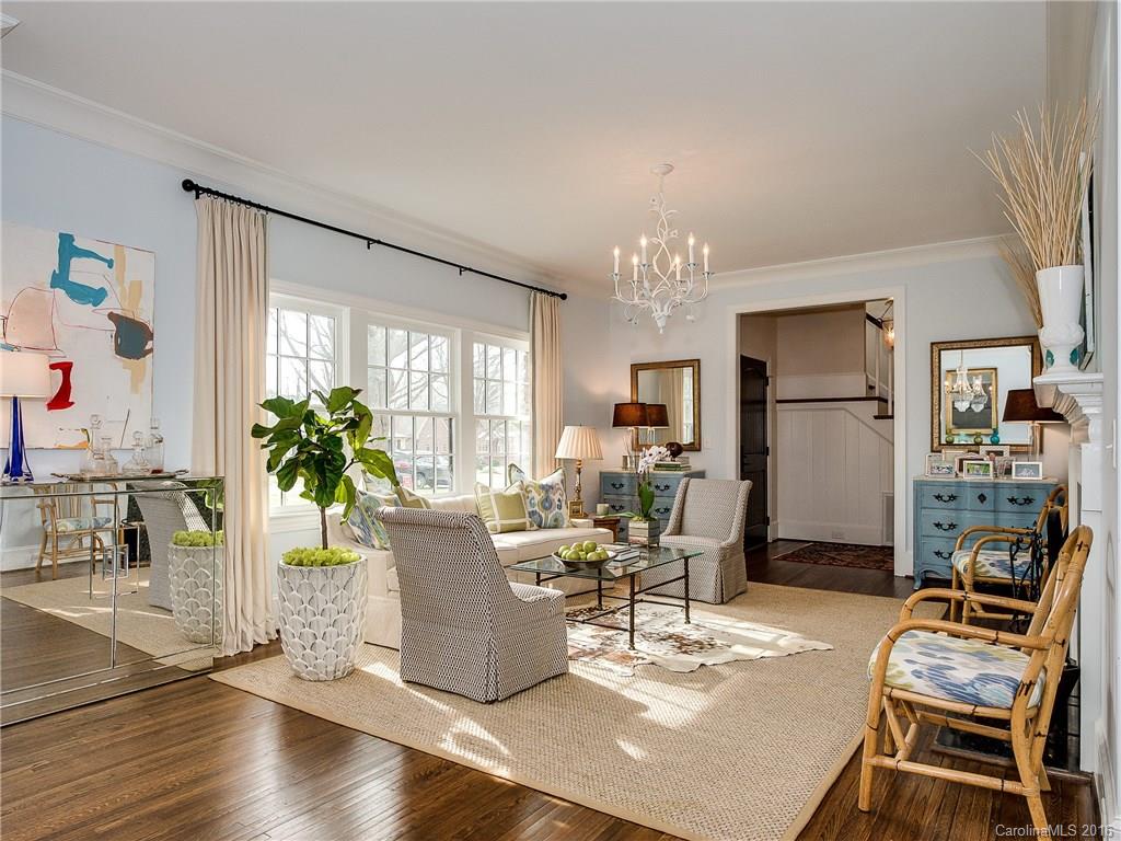 1418 Audubon Road Charlotte, NC 28211 - Photo 3 of 24 a living room with furniture and a chandelier