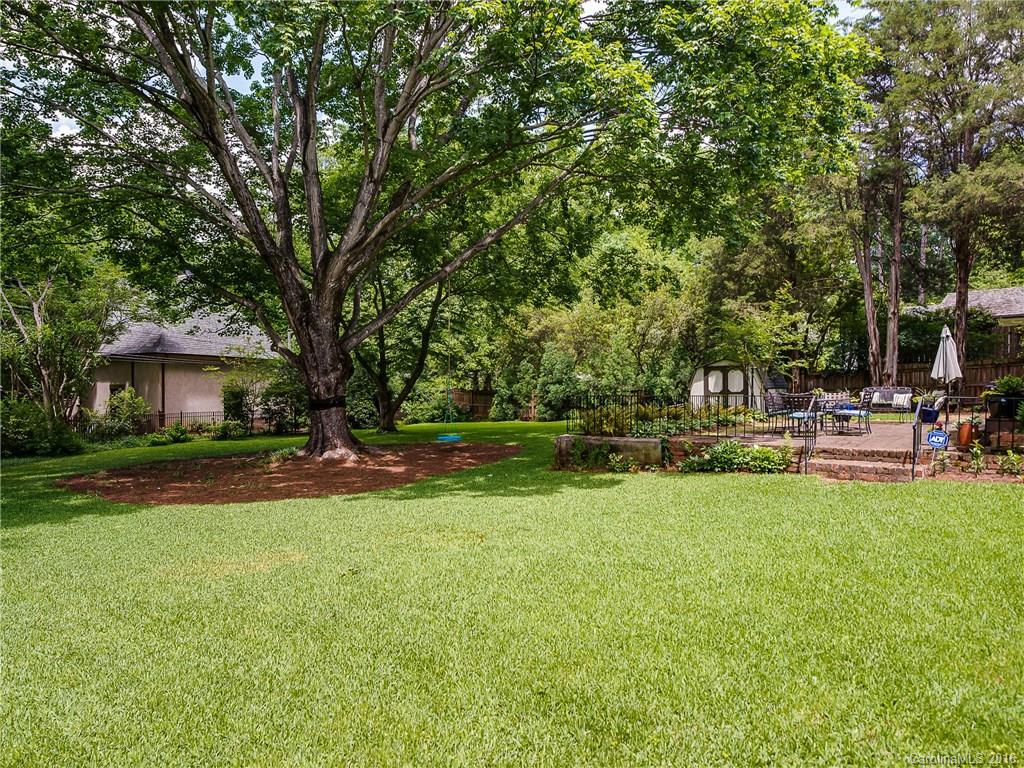 1418 Audubon Road Charlotte, NC 28211 - Photo 24 of 24 a view of a house with swimming pool and sitting area