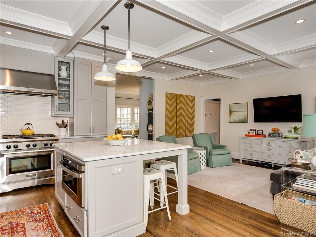 1418 Audubon Road Charlotte, NC 28211 - Photo 8 of 24 a kitchen that has a stove and a microwave