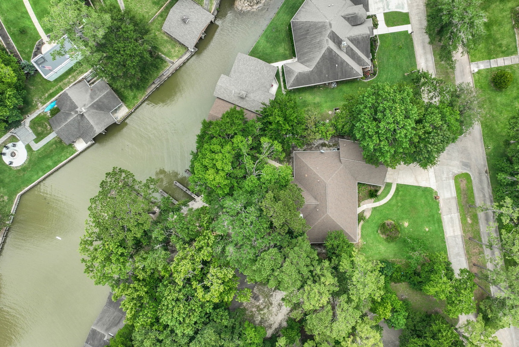 210 Harbor Run Drive Coldspring, TX 77331 - Photo 37 of 43 an aerial view of a house with a yard and trees