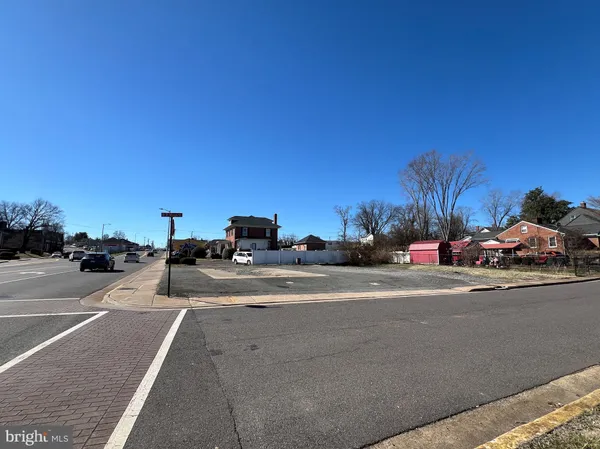 a view of a city street with cars
