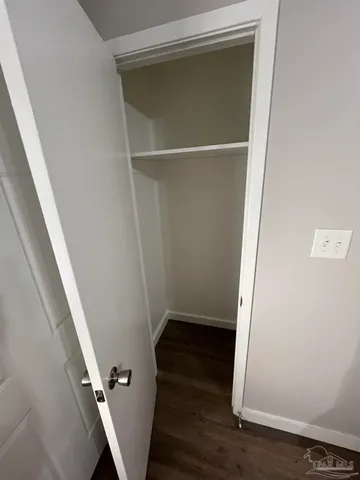 a view of an empty walk in closet