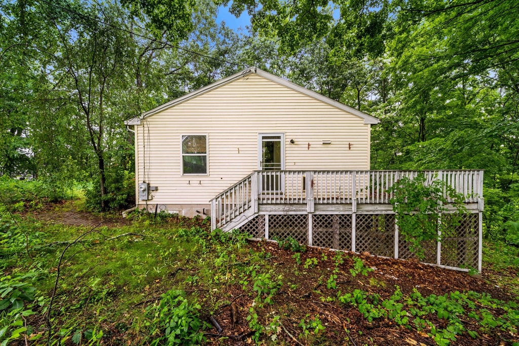 7 Upland Road Natick, MA 01760 - Photo 10 of 15 a view of a house with backyard