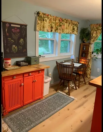 a bedroom with a bed and dresser