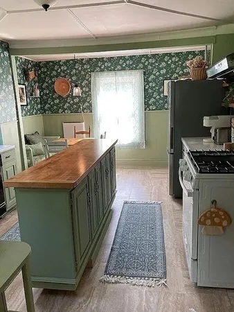 a dining room with a fireplace and a table