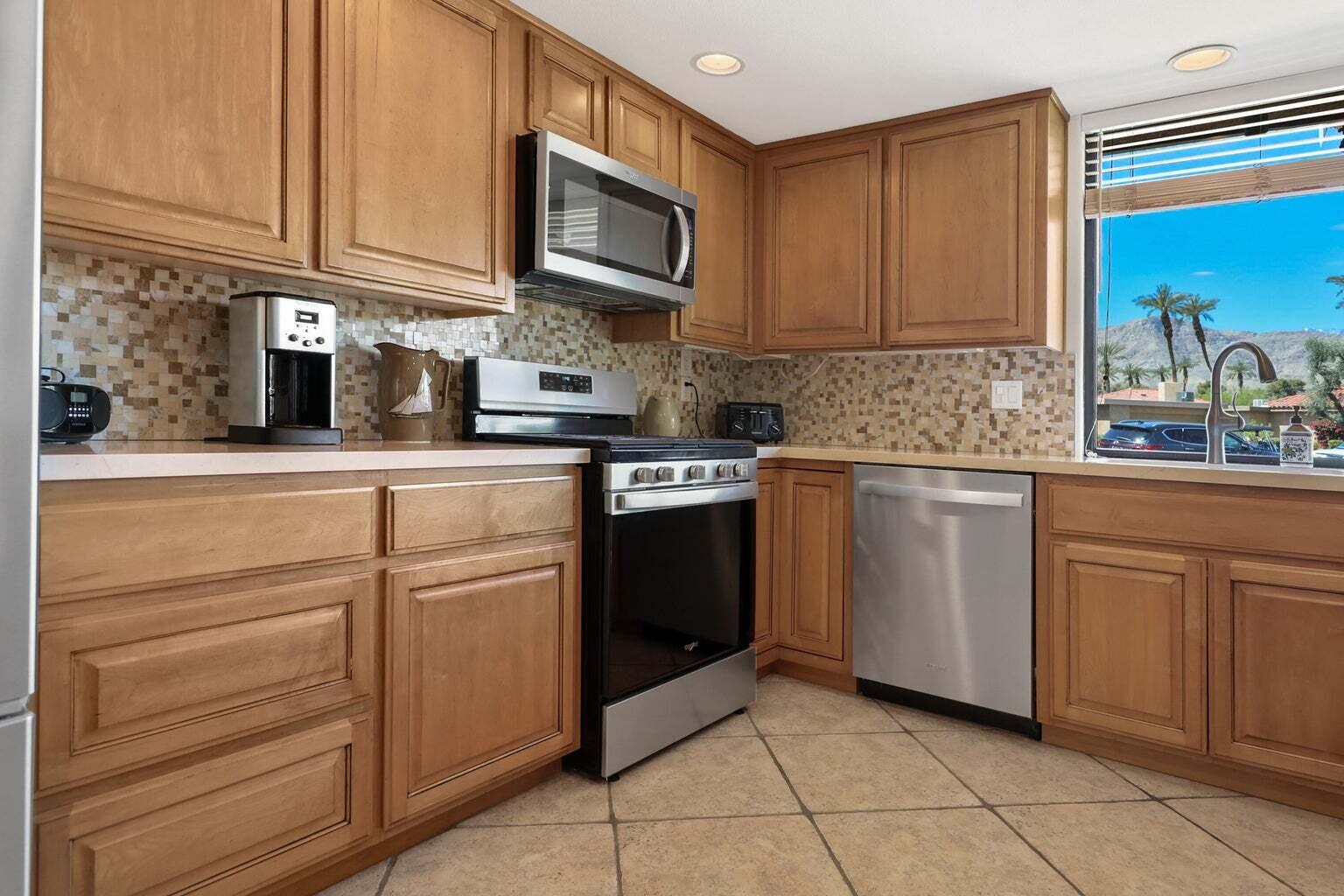 89 La Ronda Drive Rancho Mirage, CA 92270 - Photo 3 of 44 Updated Countertop and Cabinets