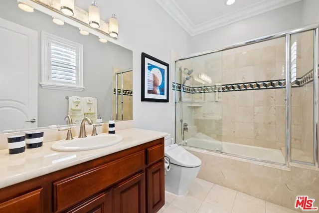 a view of a yard with plants and outdoor seating