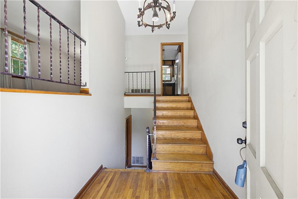 4188 Cedar Valley Lane Conley, GA 30288 - Photo 17 of 28 a view of a hallway with wooden floor and entryway