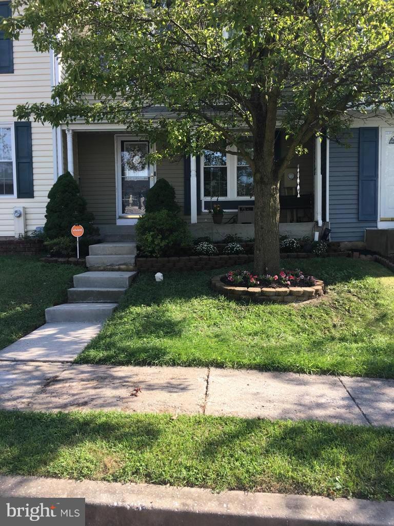 5023 Clifford Road Perry Hall, MD 21128 - Photo 2 of 28 a front view of a house with garden