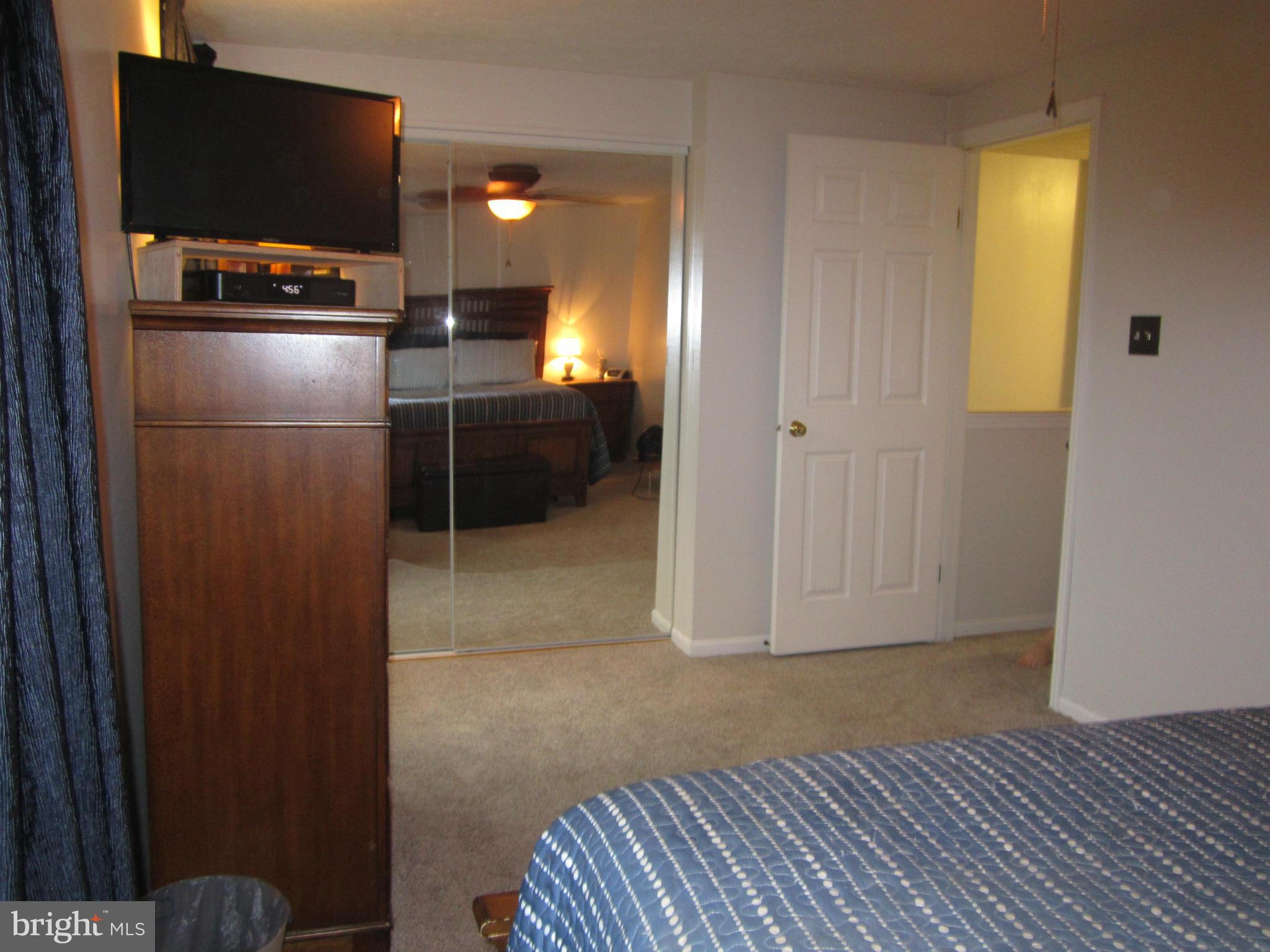 5023 Clifford Road Perry Hall, MD 21128 - Photo 15 of 28 a view of a livingroom with furniture and a flat screen tv