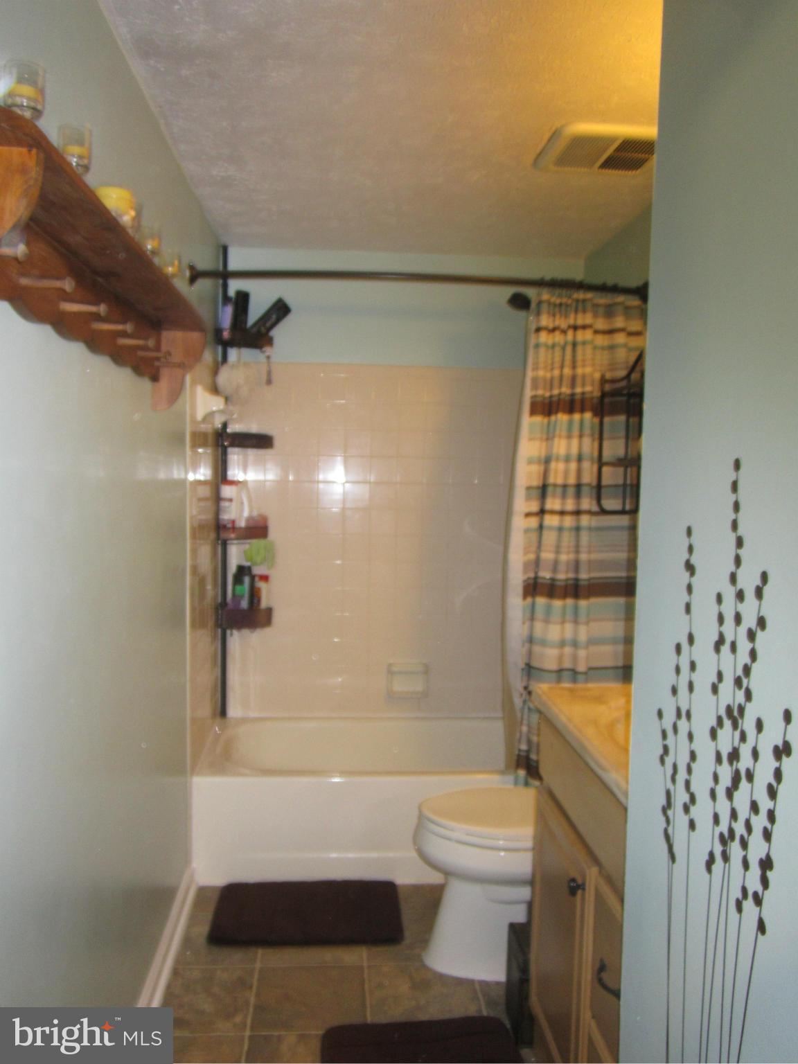 5023 Clifford Road Perry Hall, MD 21128 - Photo 18 of 28 a bathroom with a toilet and a shower