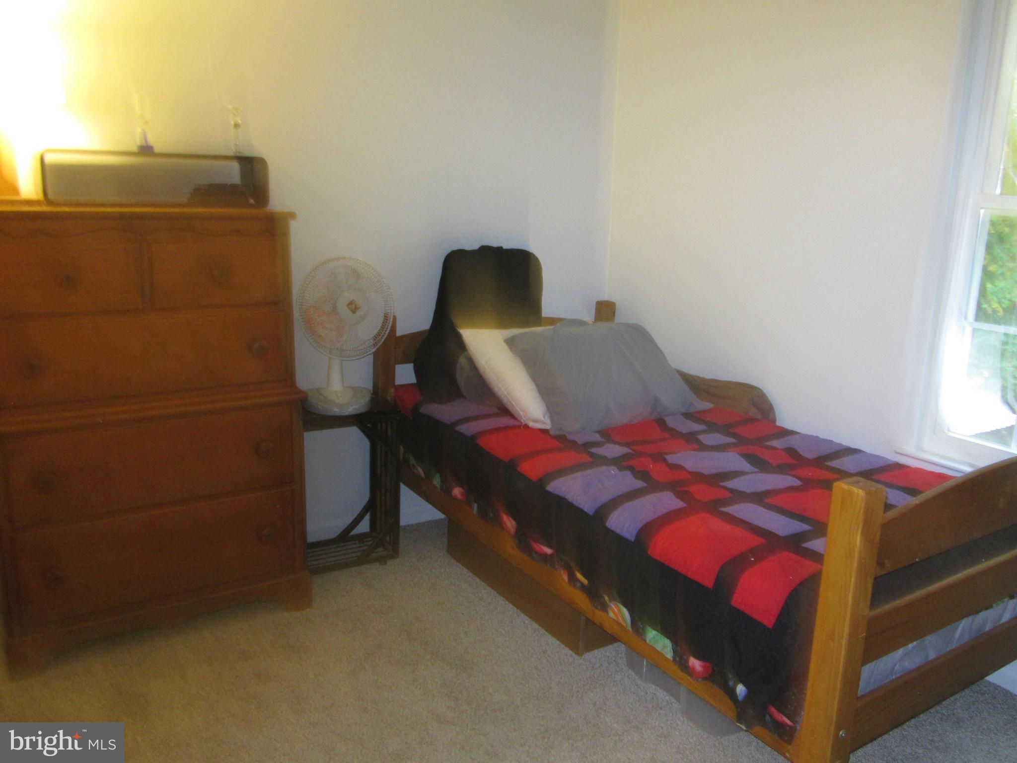 5023 Clifford Road Perry Hall, MD 21128 - Photo 21 of 28 a bedroom with a bed and a window