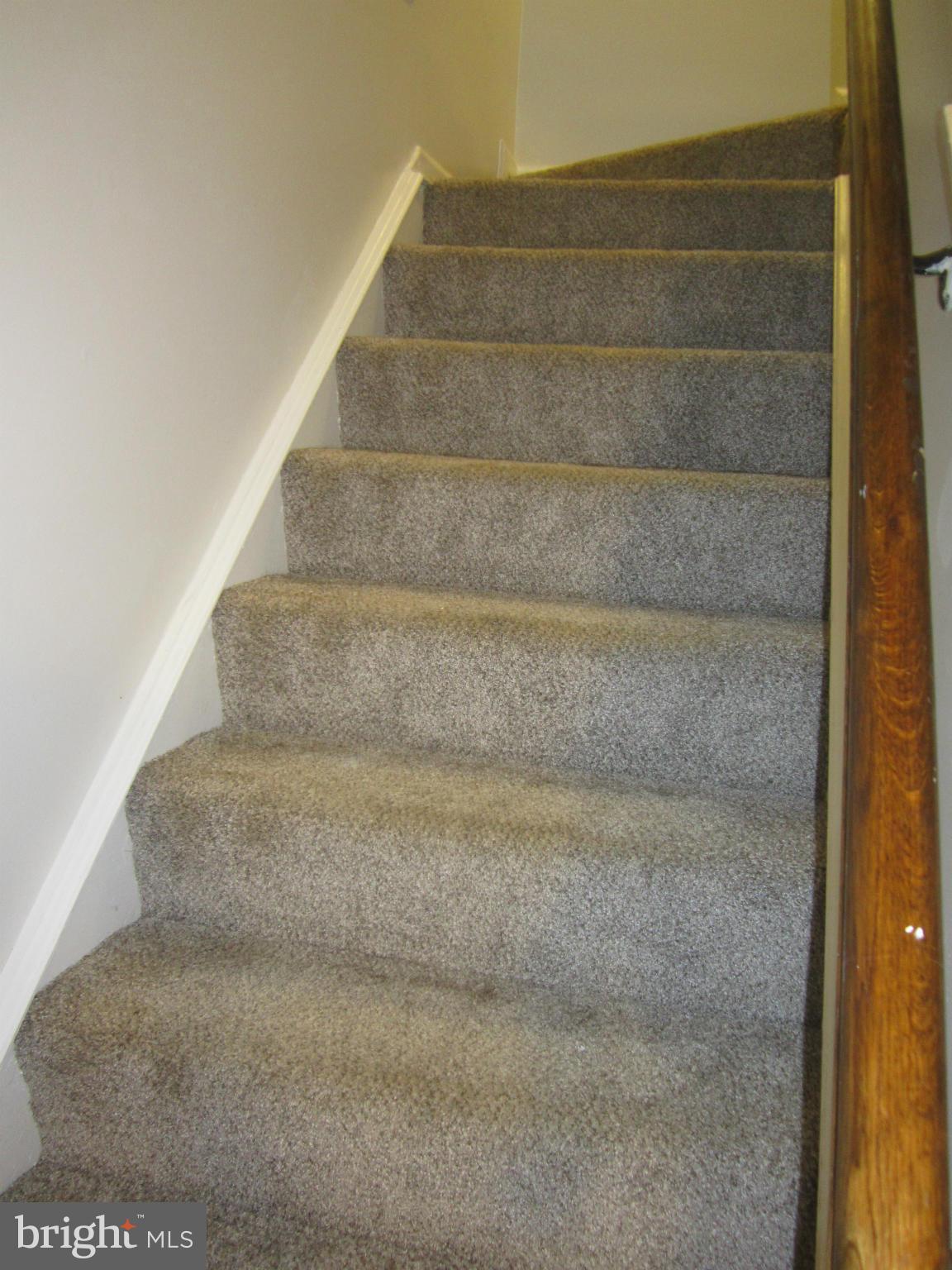 5023 Clifford Road Perry Hall, MD 21128 - Photo 22 of 28 a view of staircase with white walls