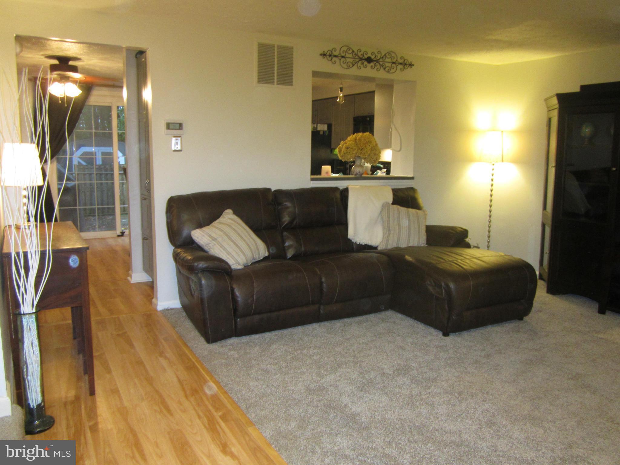 5023 Clifford Road Perry Hall, MD 21128 - Photo 5 of 28 a living room with furniture and a flat screen tv