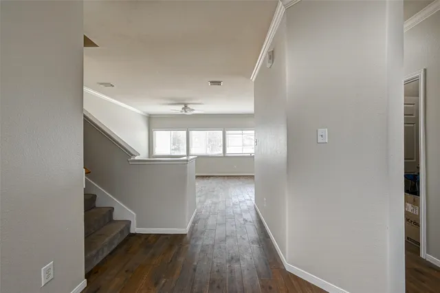 a view of entryway with wooden floor