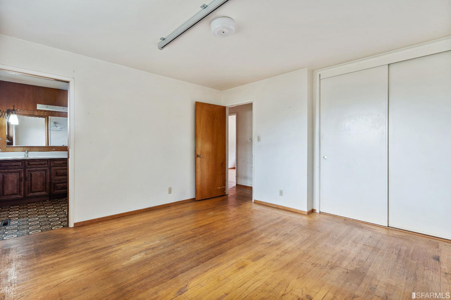 1773 Walnut Street El Cerrito, CA 94530 - Photo 12 of 43 a view of an empty room with closet and a window