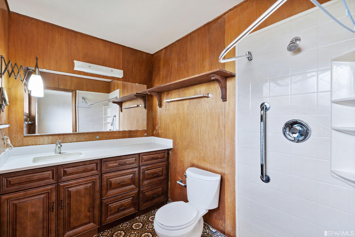 1773 Walnut Street El Cerrito, CA 94530 - Photo 13 of 43 a bathroom with a sink a toilet and shower