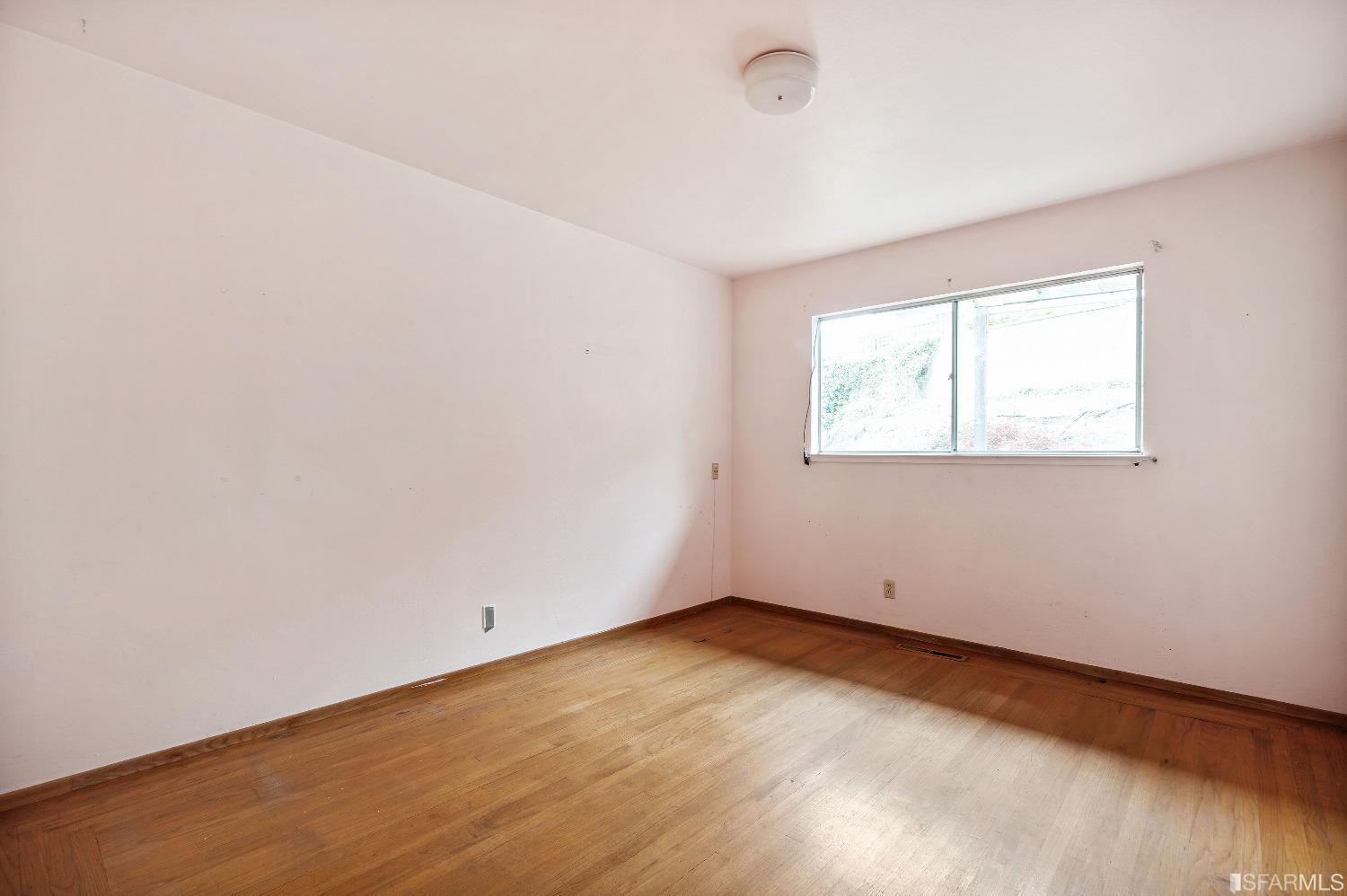 1773 Walnut Street El Cerrito, CA 94530 - Photo 20 of 43 an empty room with a window