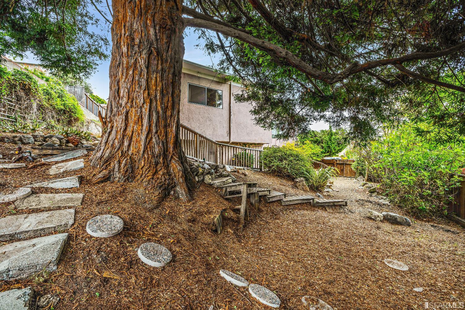 1773 Walnut Street El Cerrito, CA 94530 - Photo 26 of 43 a view of a chairs and table in backyard