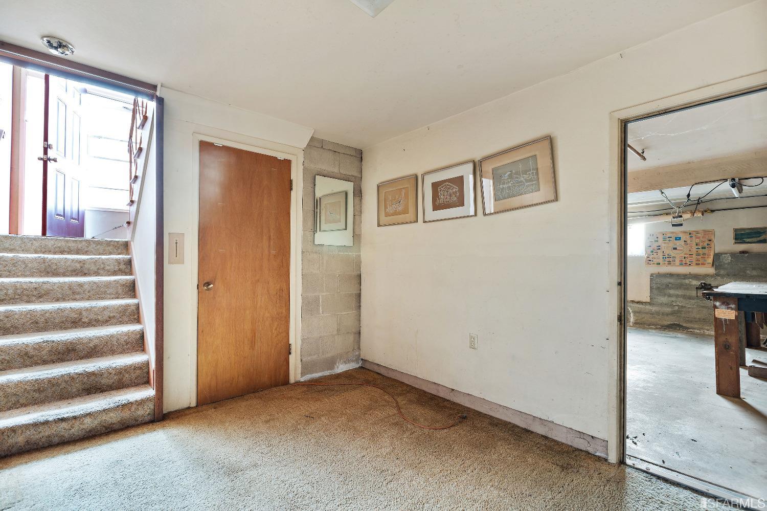 1773 Walnut Street El Cerrito, CA 94530 - Photo 29 of 43 a view of empty room with wooden floor and a window