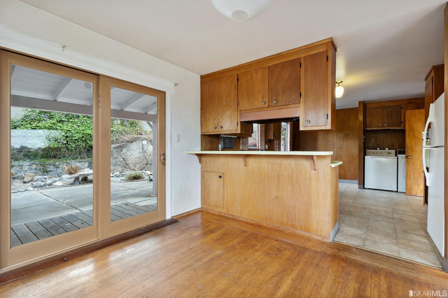 1773 Walnut Street El Cerrito, CA 94530 - Photo 5 of 43 a view of a kitchen with wooden floor and a kitchen