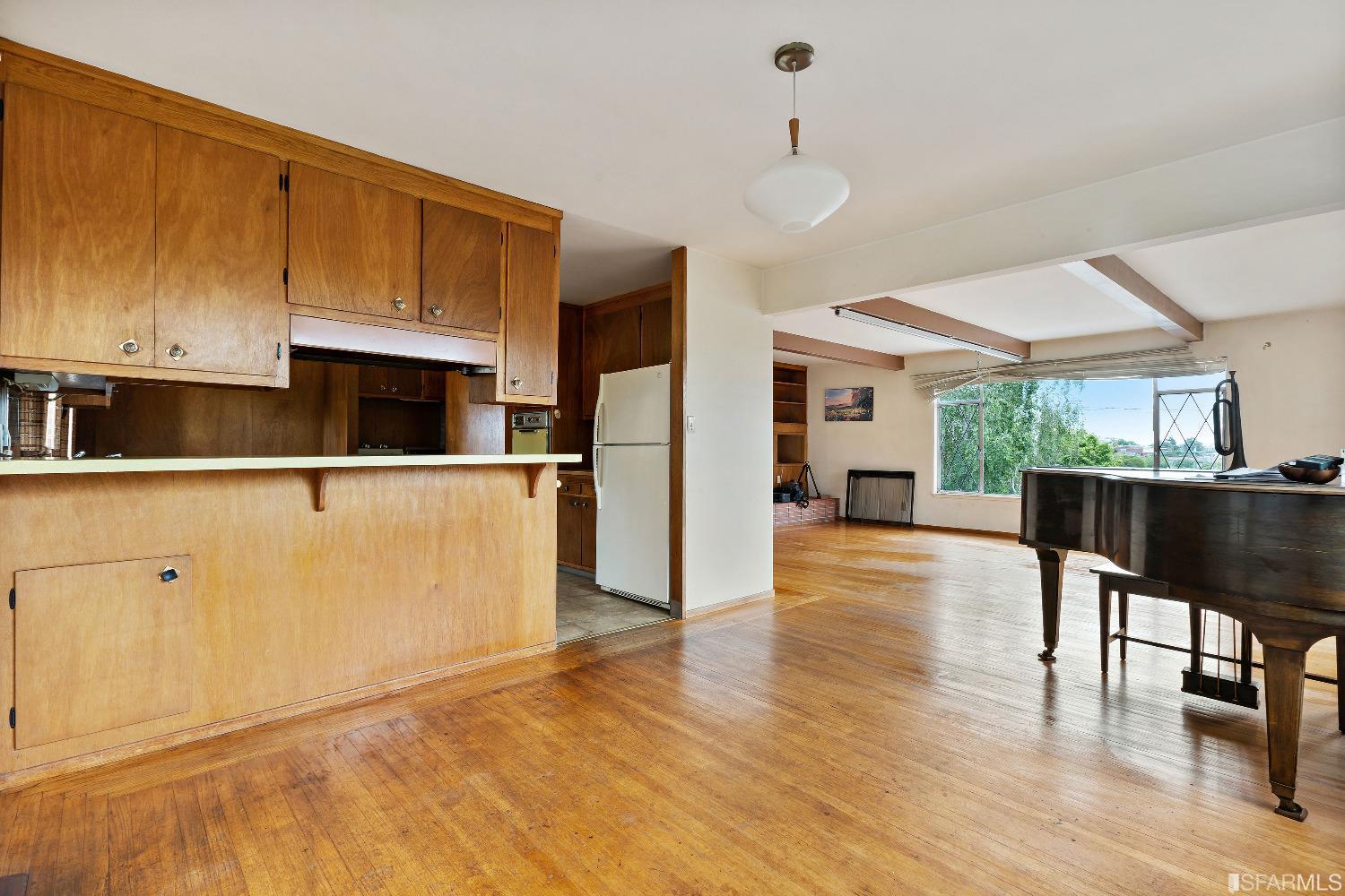 1773 Walnut Street El Cerrito, CA 94530 - Photo 6 of 43 a view of a kitchen with furniture and wooden floor