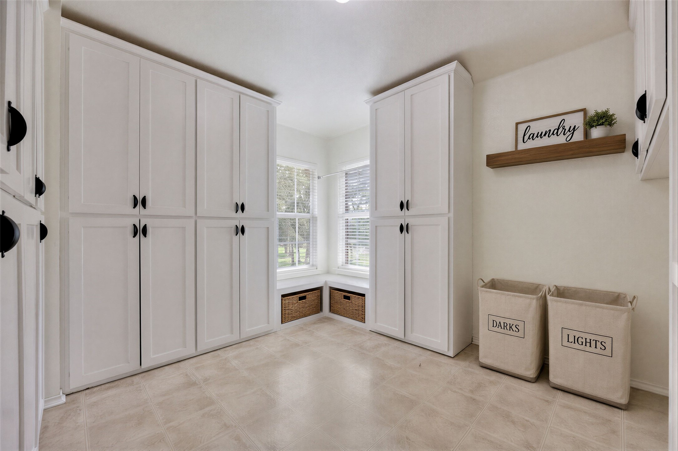 122 Avenida Brisa Fresca Road Kyle, TX 78640 - Photo 27 of 36 Enormous laundry room with natural light and abundant storage