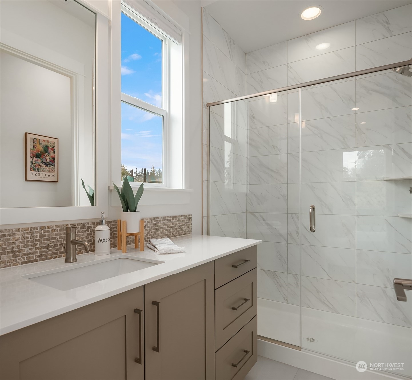 3322 219th Place Southeast Bothell, WA 98021 - Photo 17 of 37 a bathroom with a granite countertop sink a mirror and a shower