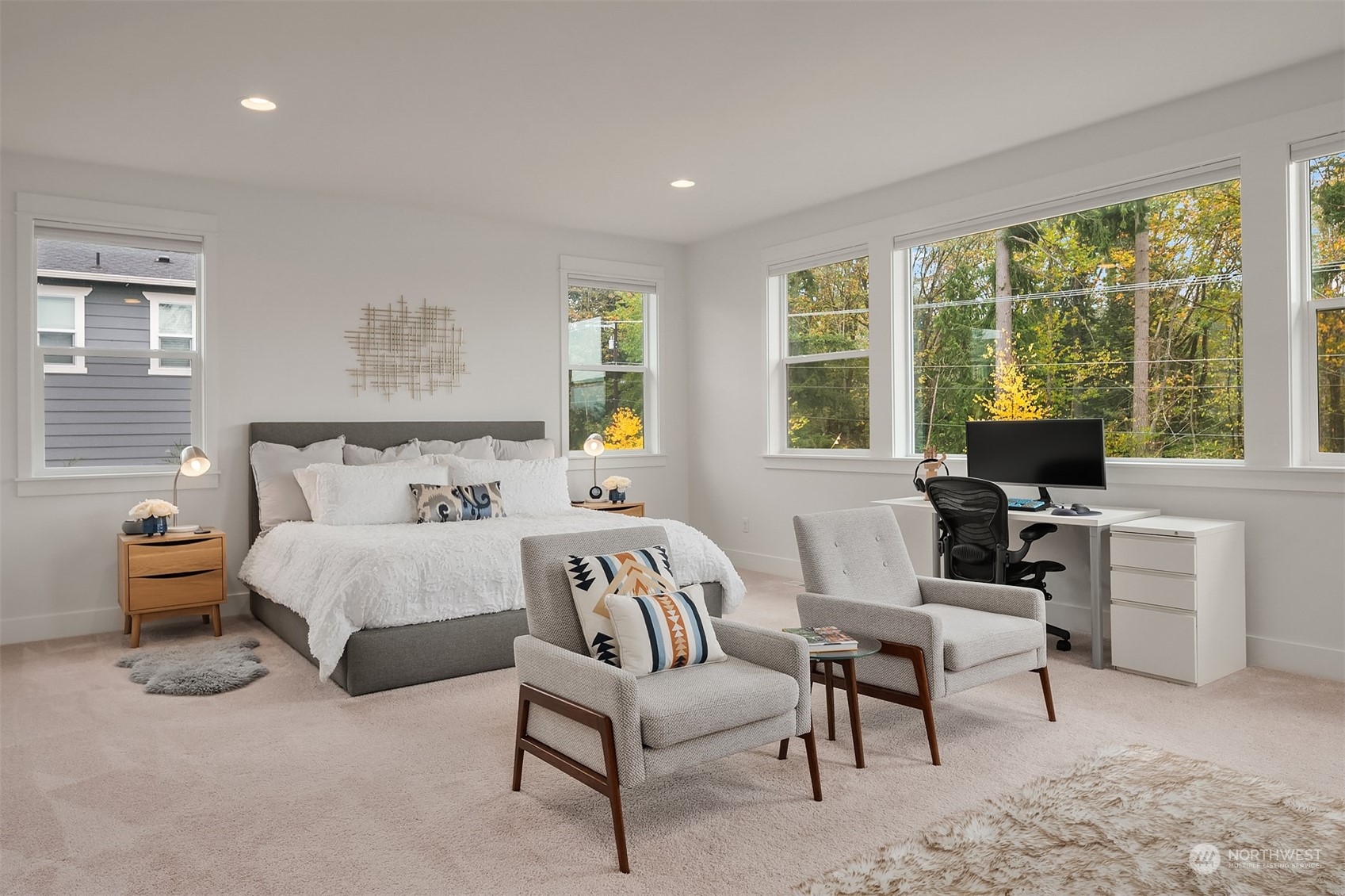 3322 219th Place Southeast Bothell, WA 98021 - Photo 23 of 37 a bedroom with furniture and a large window