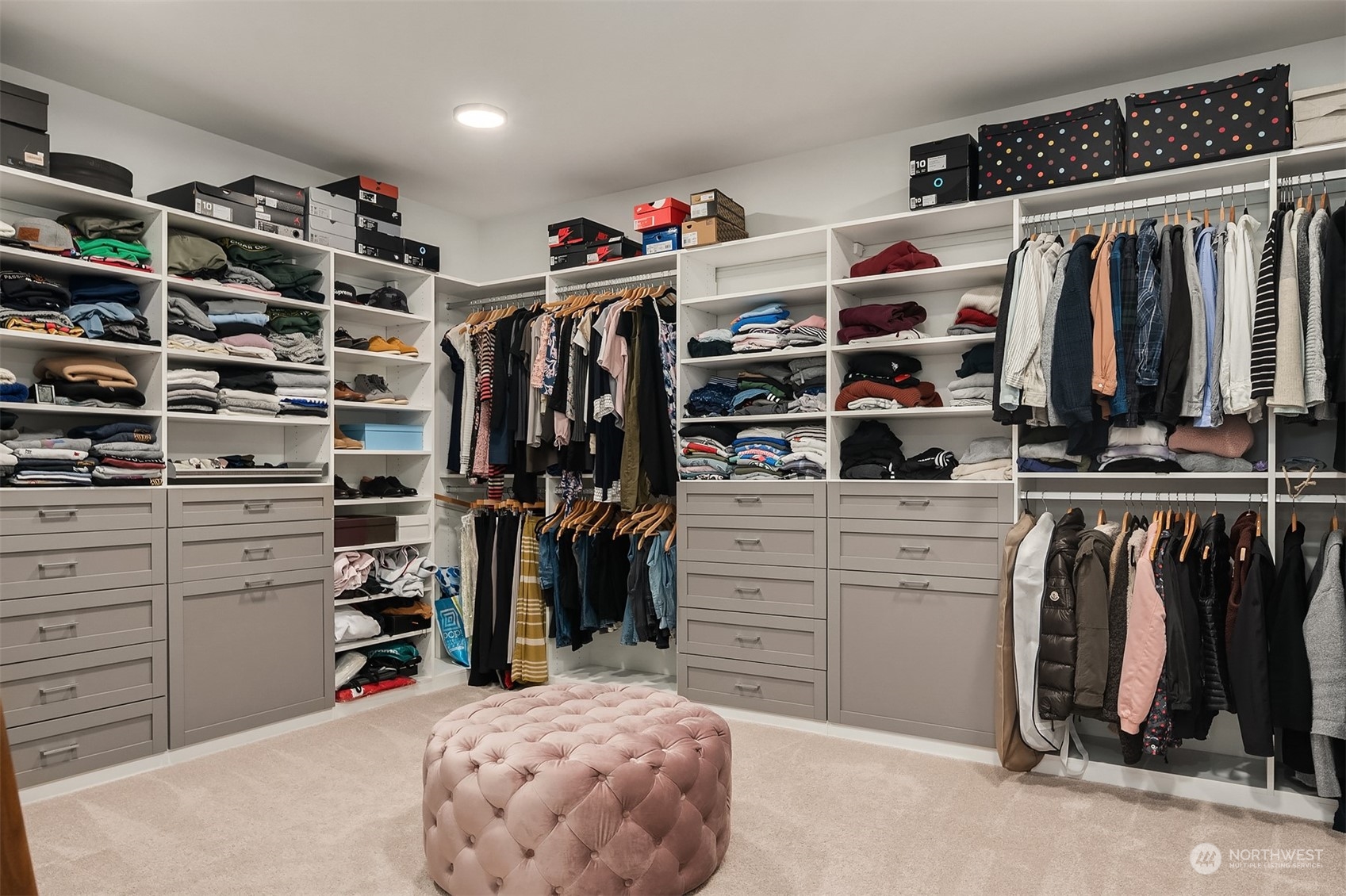 3322 219th Place Southeast Bothell, WA 98021 - Photo 24 of 37 a view of walk in closet with clothes and shoes