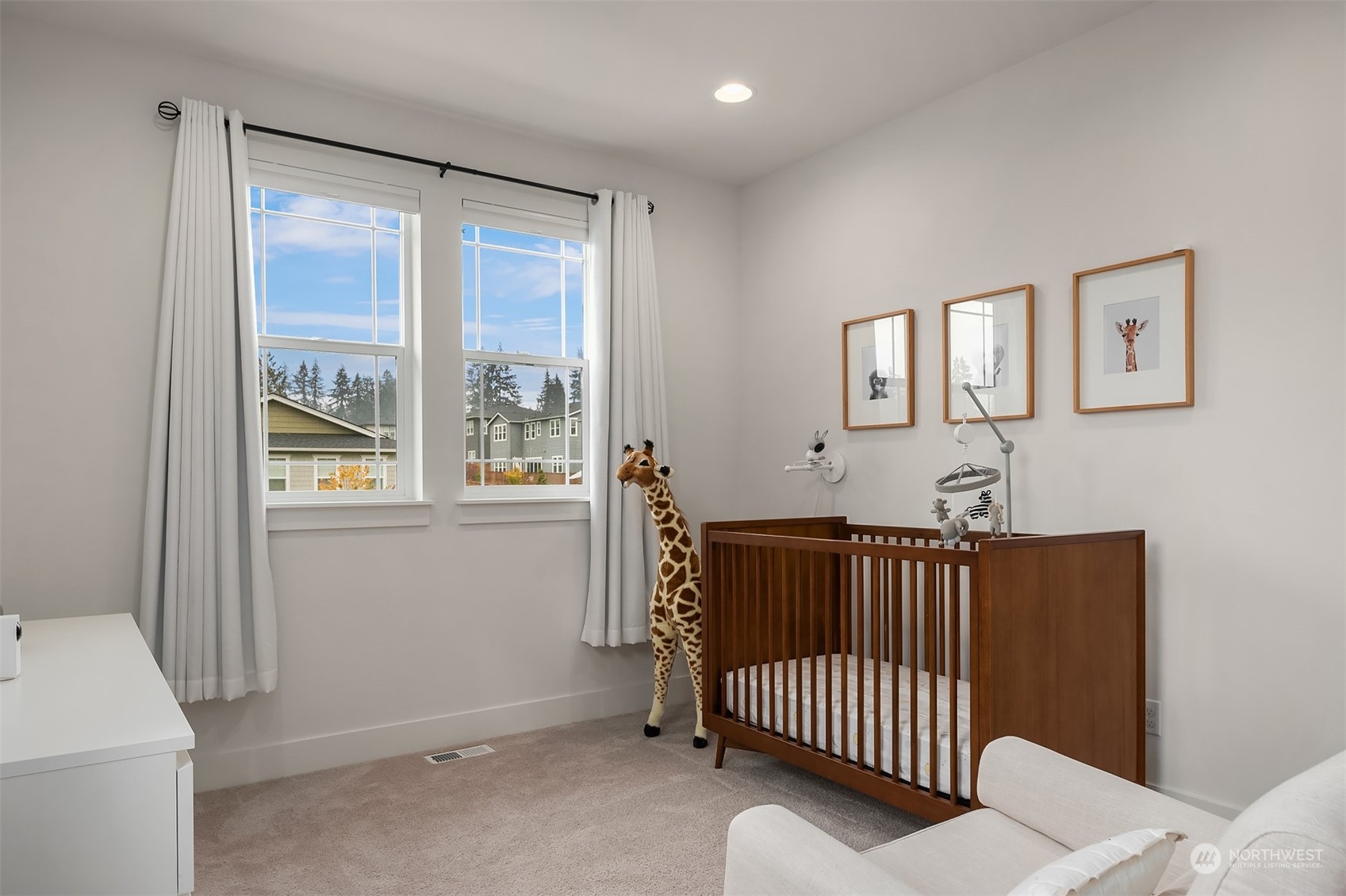 3322 219th Place Southeast Bothell, WA 98021 - Photo 28 of 37 a view of a bedroom with furniture and windows