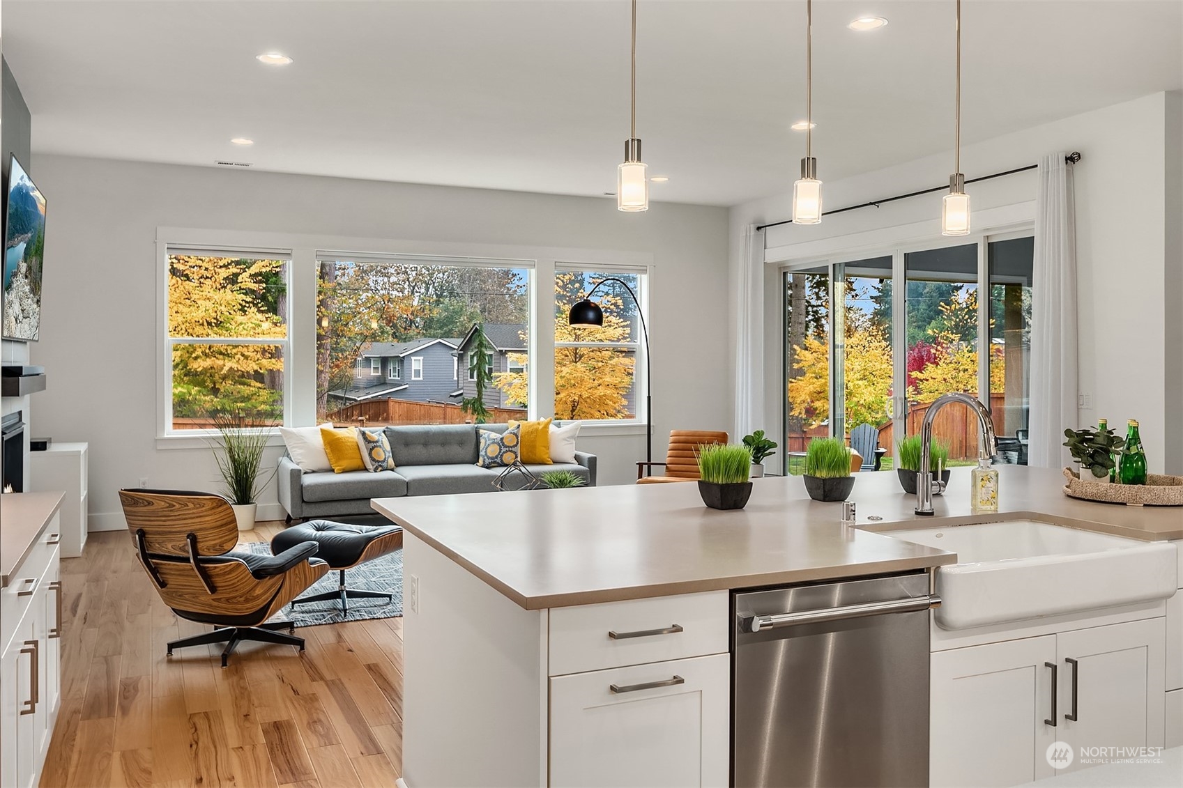 3322 219th Place Southeast Bothell, WA 98021 - Photo 7 of 37 a view of a kitchen area with furniture and windows