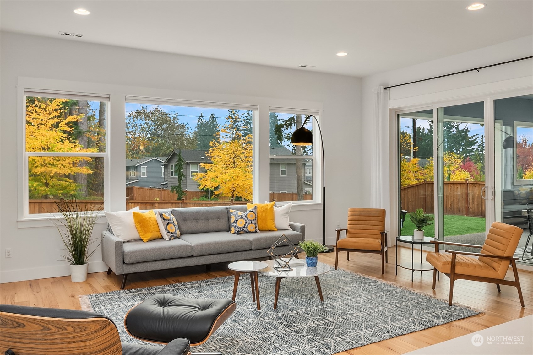 3322 219th Place Southeast Bothell, WA 98021 - Photo 10 of 37 a living room with furniture and a large window