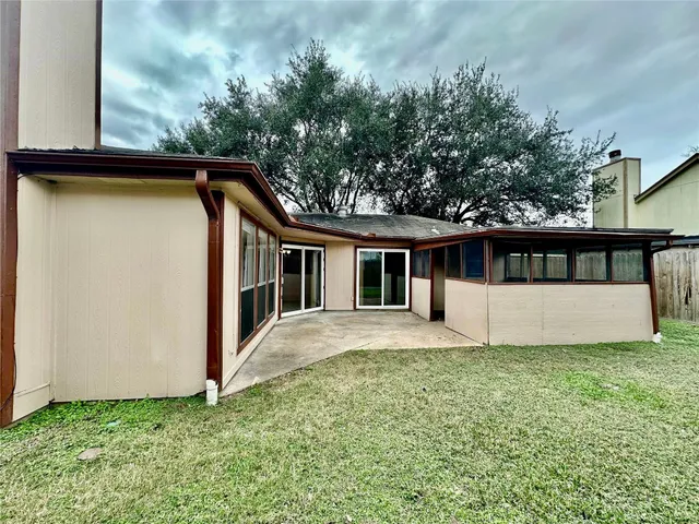 a backyard of a house with lots of green space