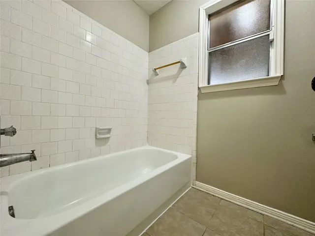 a bathroom with a bathtub