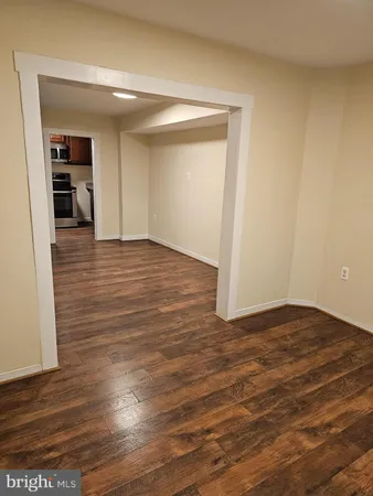 a view of entryway with wooden floor
