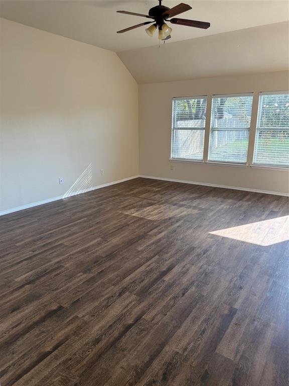 4116 Majestic Court Fort Worth, TX 76244 - Photo 12 of 37 an empty room with wooden floor fan and windows