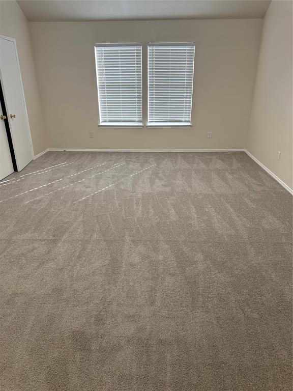 4116 Majestic Court Fort Worth, TX 76244 - Photo 21 of 37 an empty room with windows