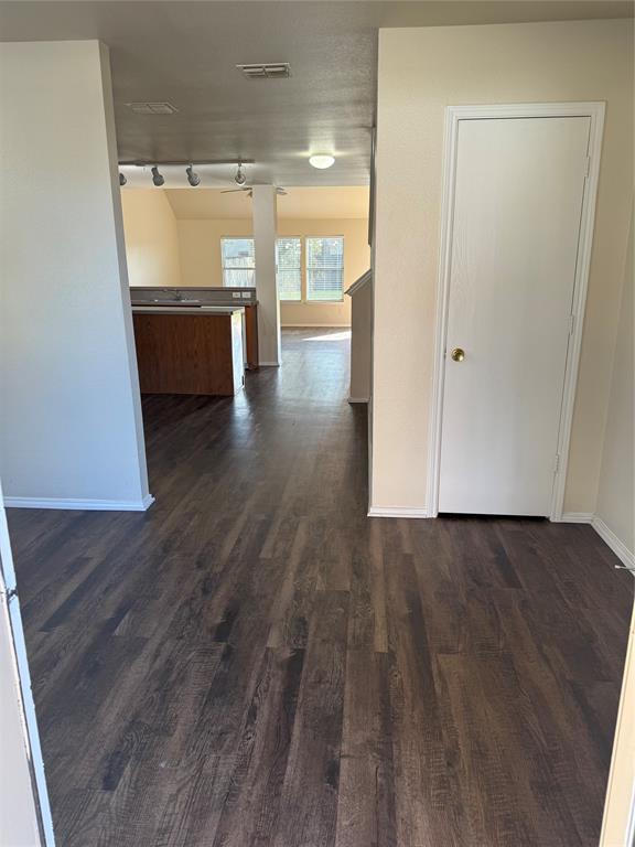 4116 Majestic Court Fort Worth, TX 76244 - Photo 3 of 37 a view of walk in closet with wooden floor