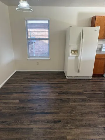 a kitchen with stainless steel appliances granite countertop a sink counter space and cabinets
