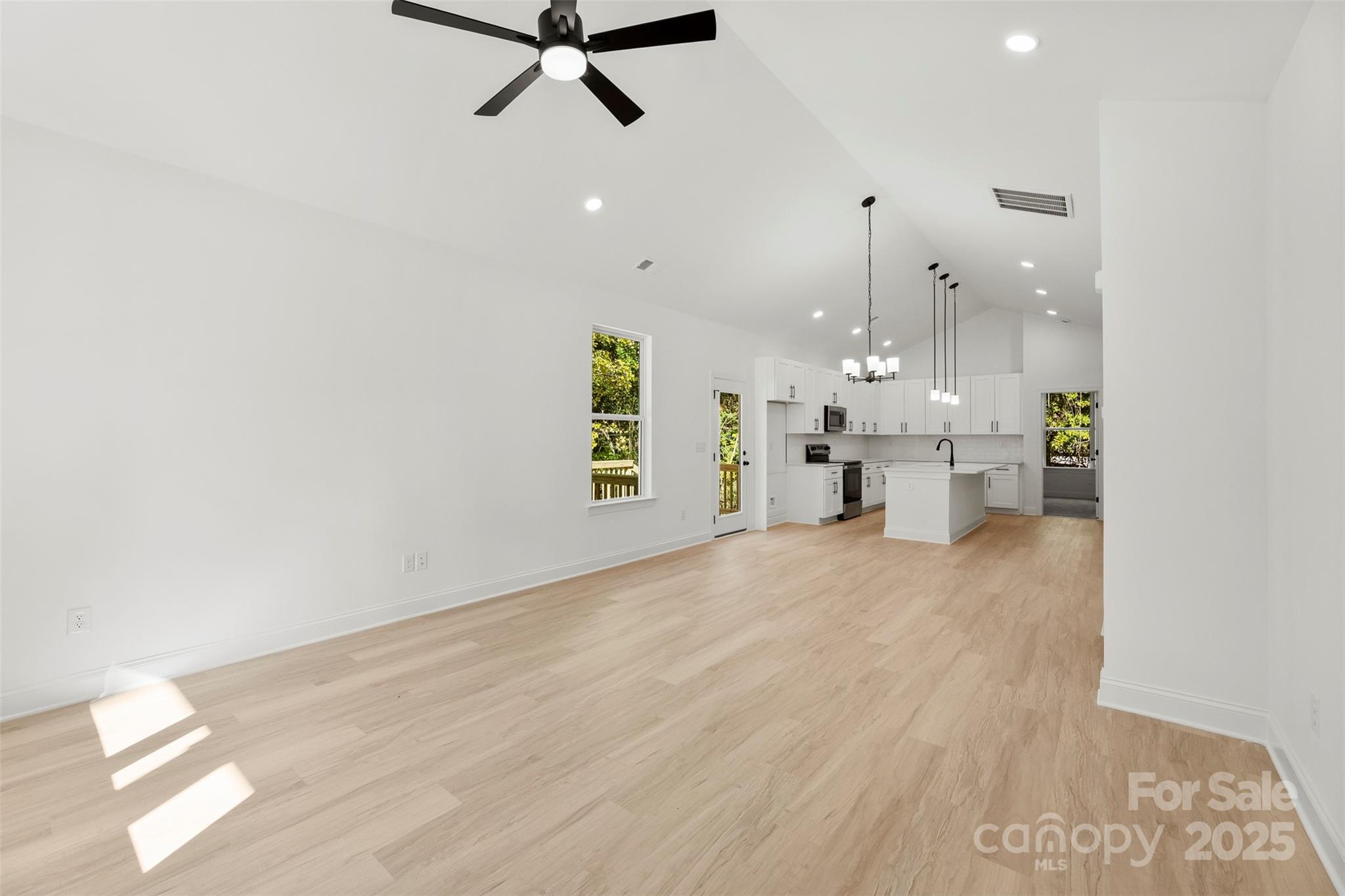 90 Sumner Avenue Northwest Concord, NC 28027 - Photo 12 of 40 a view of a kitchen with a sink and a window