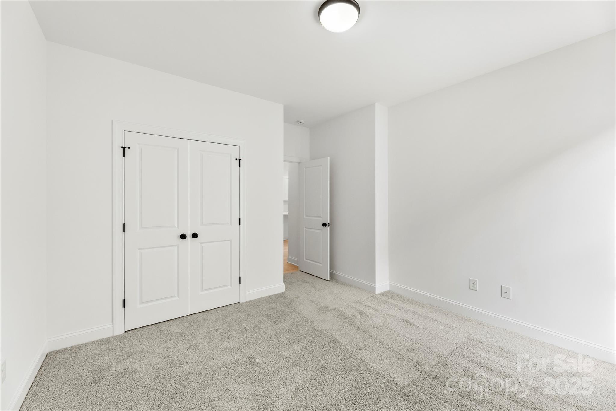 90 Sumner Avenue Northwest Concord, NC 28027 - Photo 30 of 40 a view of an empty room