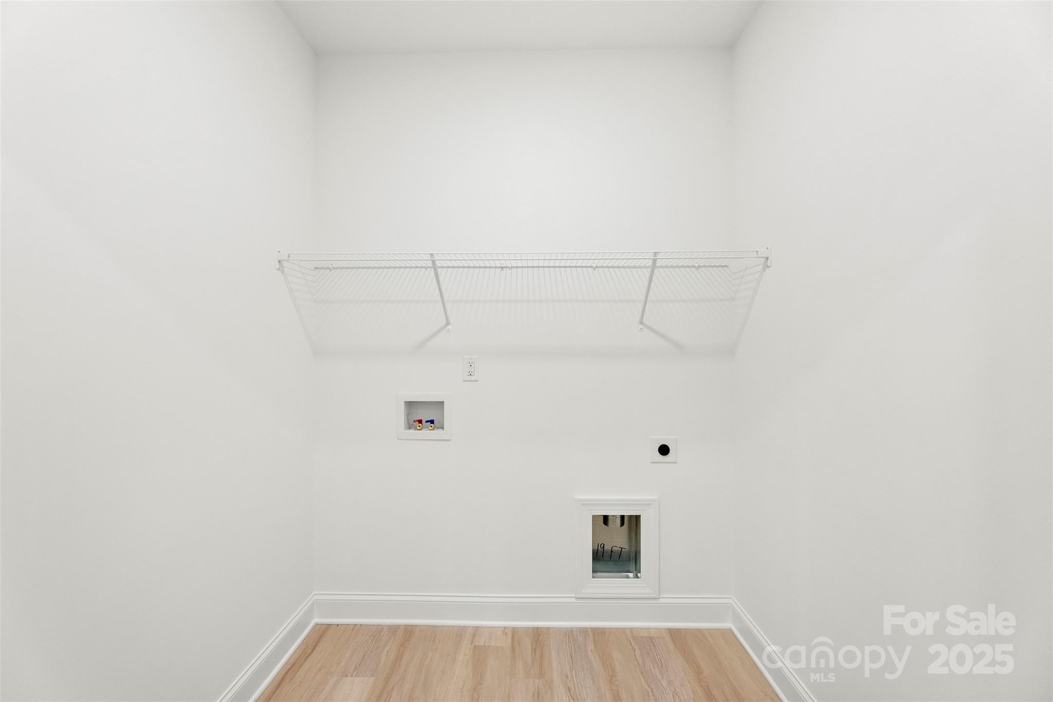 90 Sumner Avenue Northwest Concord, NC 28027 - Photo 32 of 40 a view of a room with racks on the wall