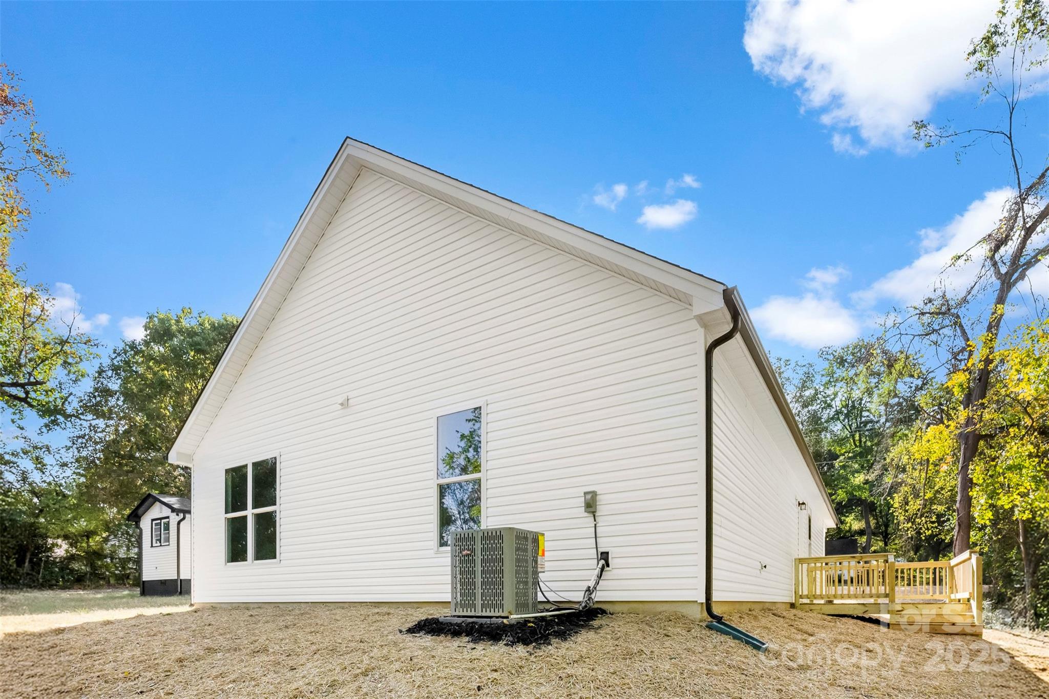 90 Sumner Avenue Northwest Concord, NC 28027 - Photo 35 of 40 a view of a house with a roof deck