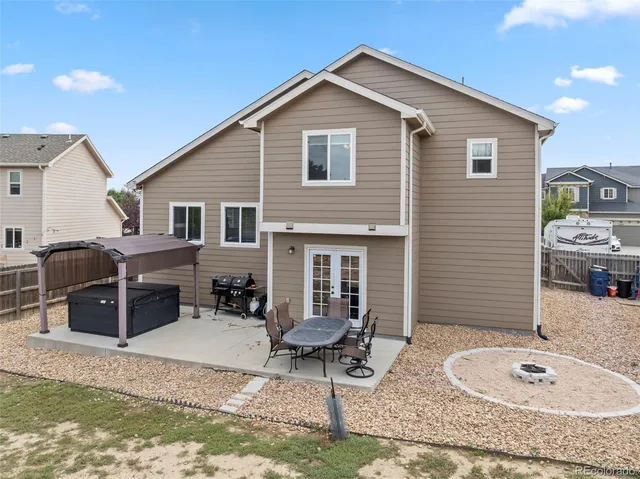 a front view of a house with a garage