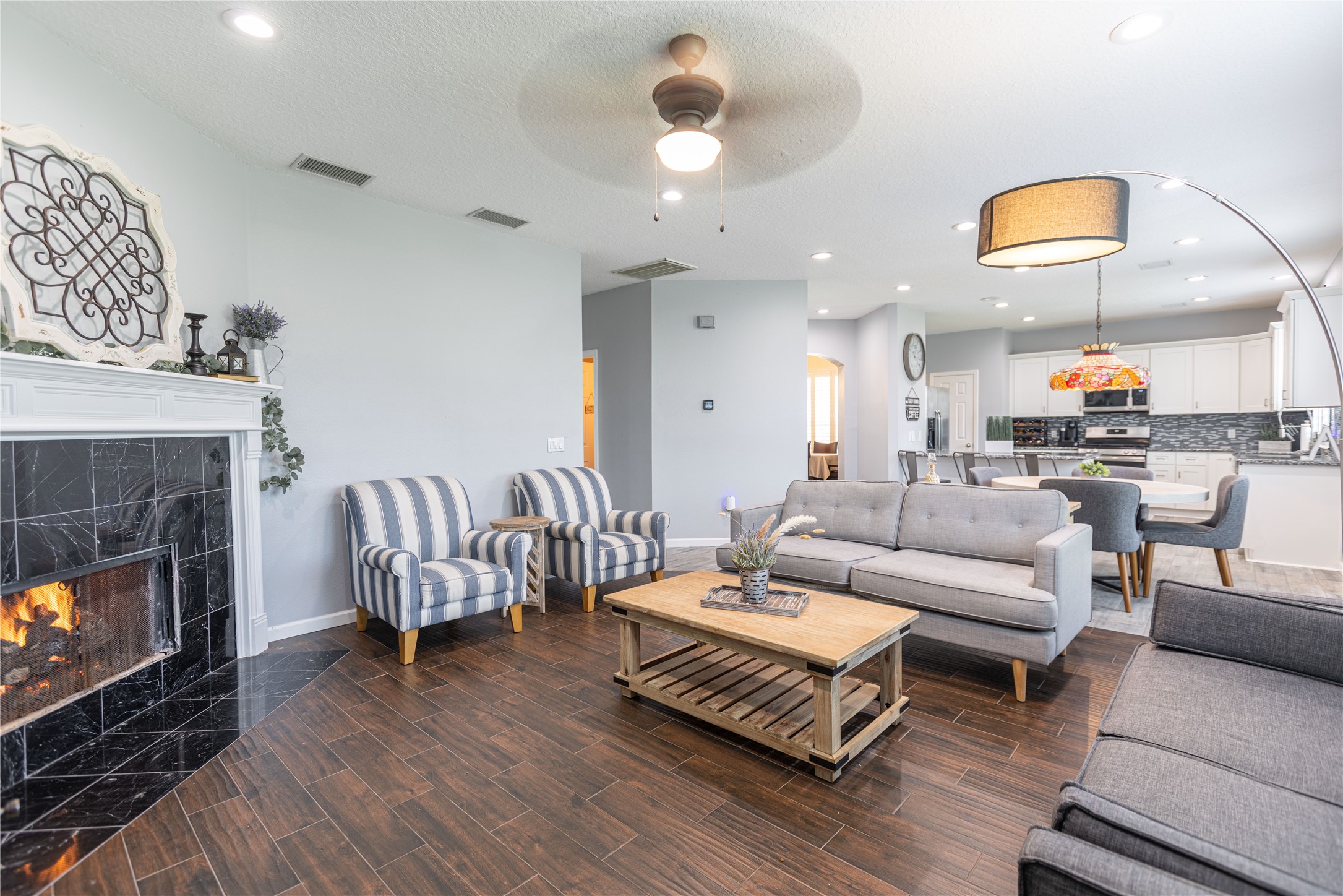 5922 Walkabout Way Katy, TX 77450 - Photo 20 of 38 View from the family room showcases the open-concept layout connecting the breakfast area and kitchen