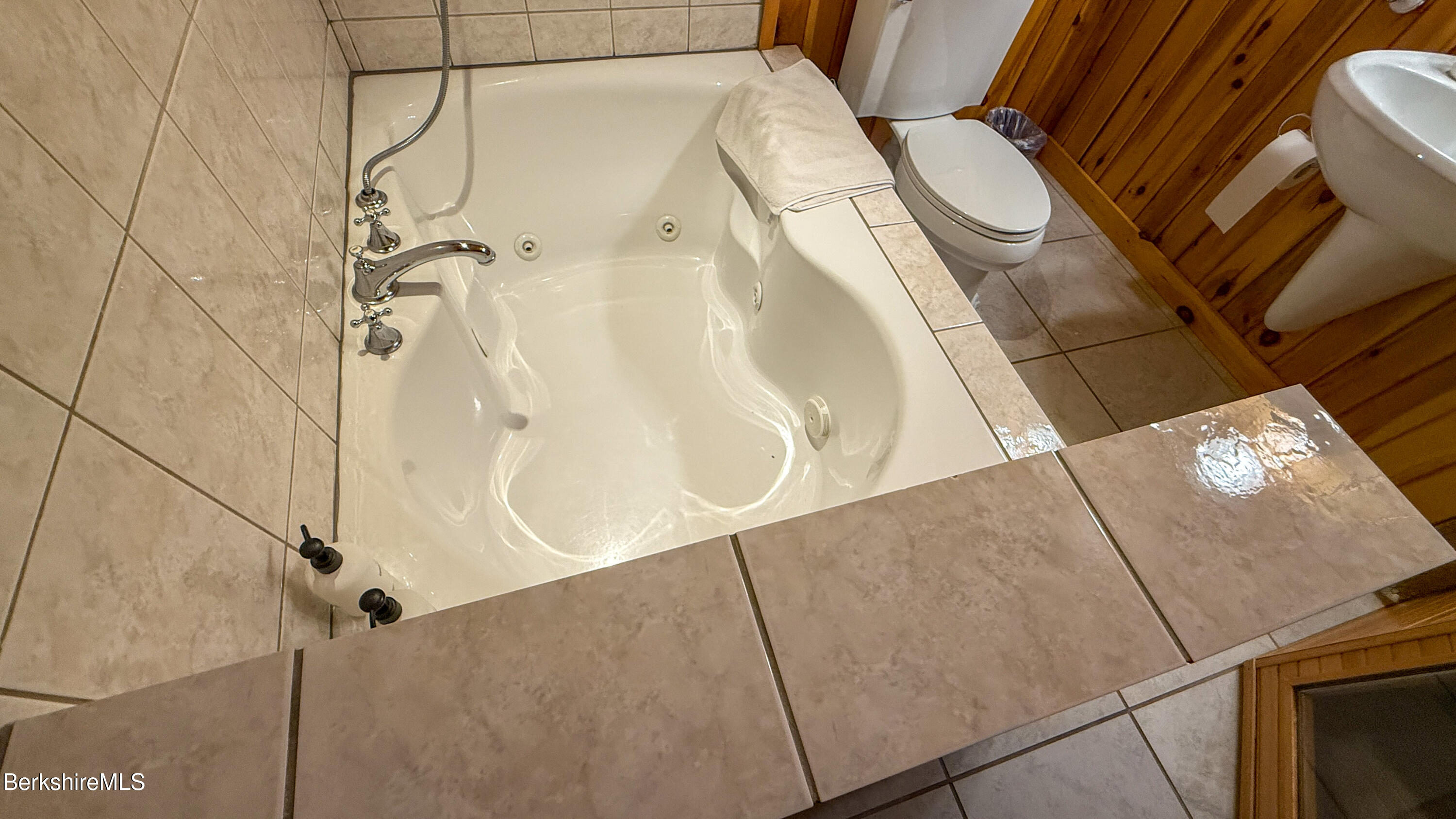 233 Algerie Road Becket, MA 01223 - Photo 41 of 48 a bathroom with a toilet and shower