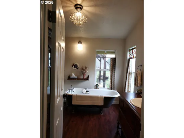 a bathroom with a sink a mirror and a toilet
